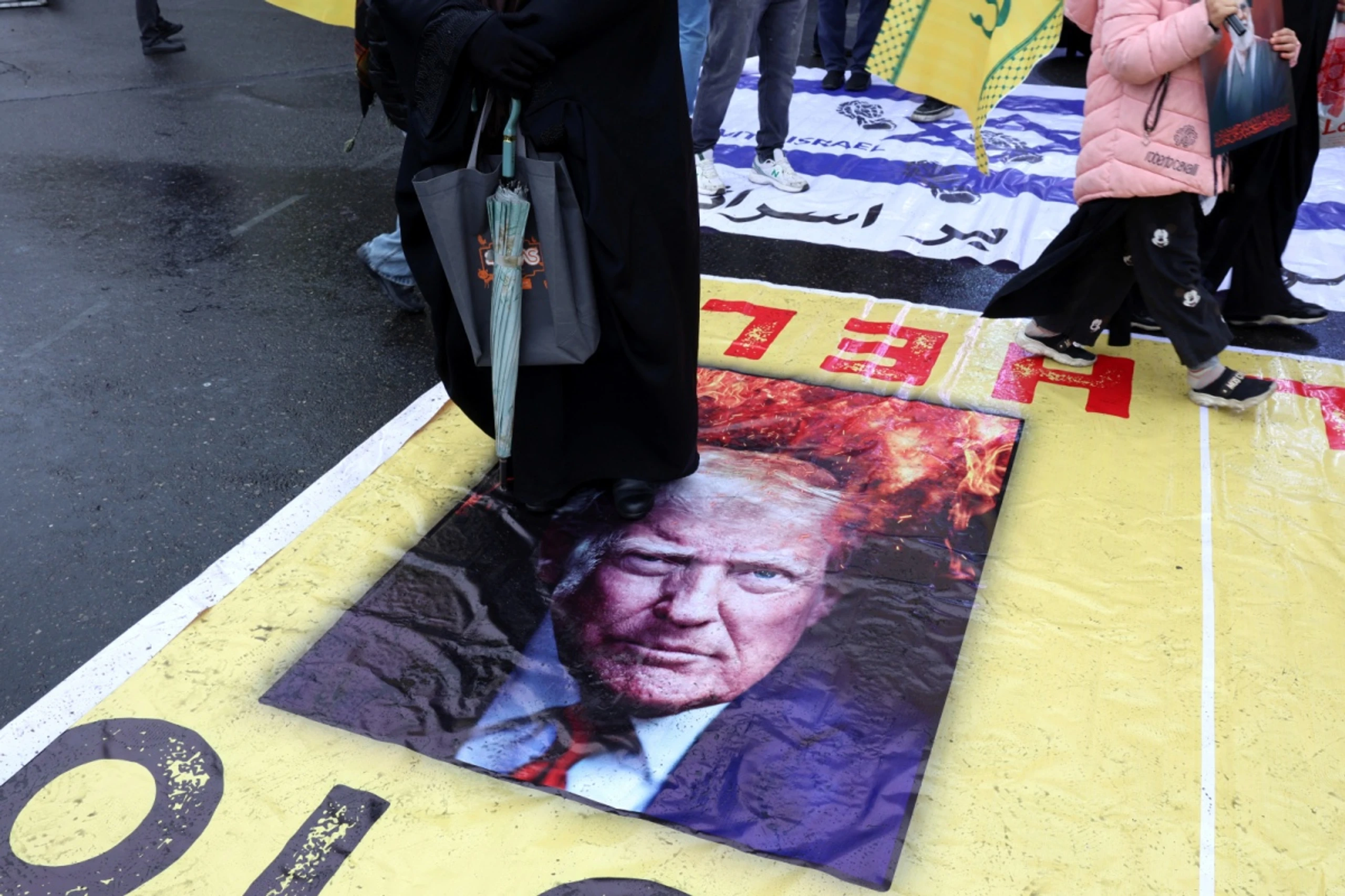 Demonstration in Teheran mit Konterfei von Trump