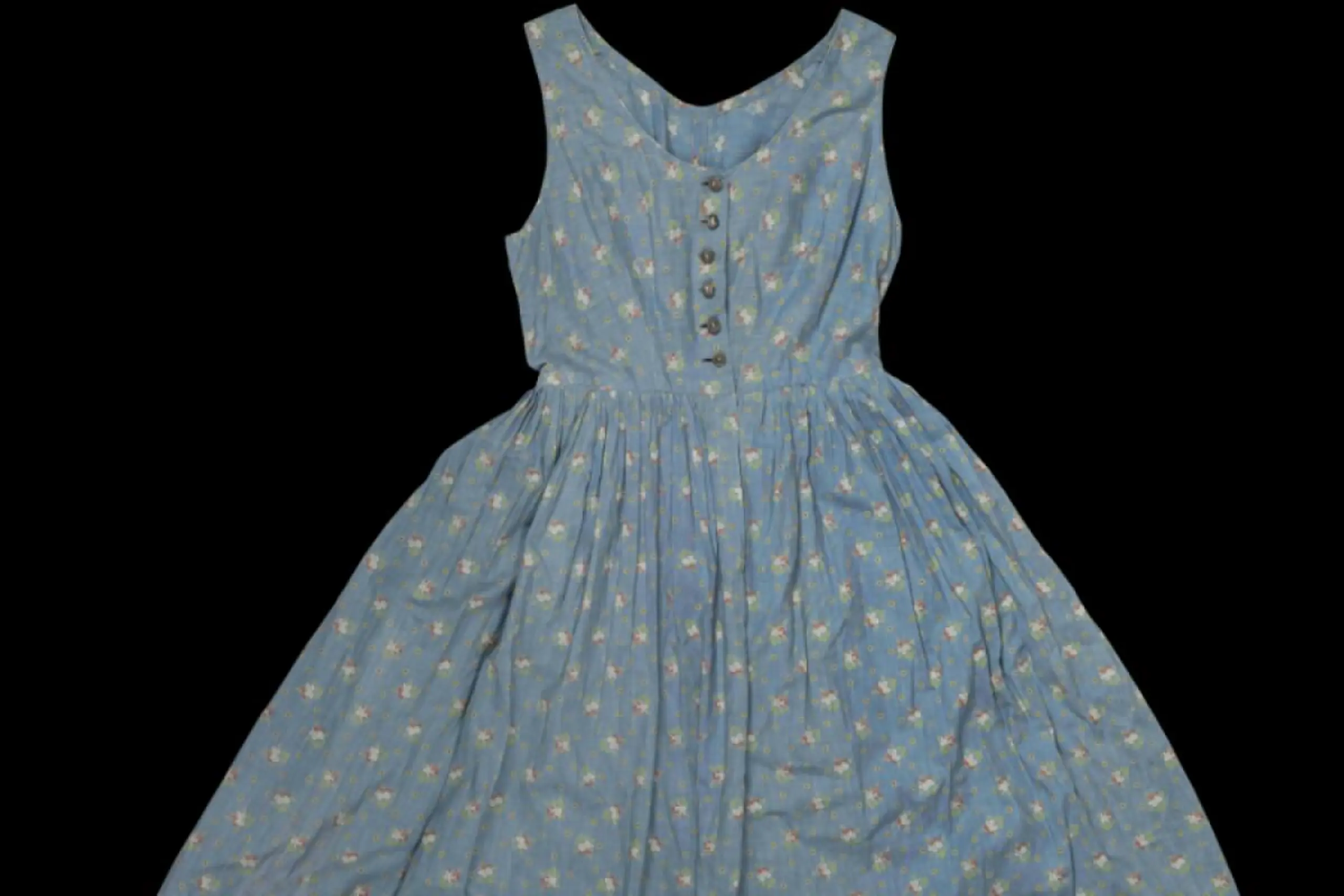 Ein Dirndl als Begleiterin in die neue Heimat